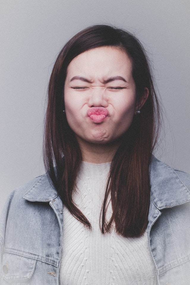 Woman making silly face expression